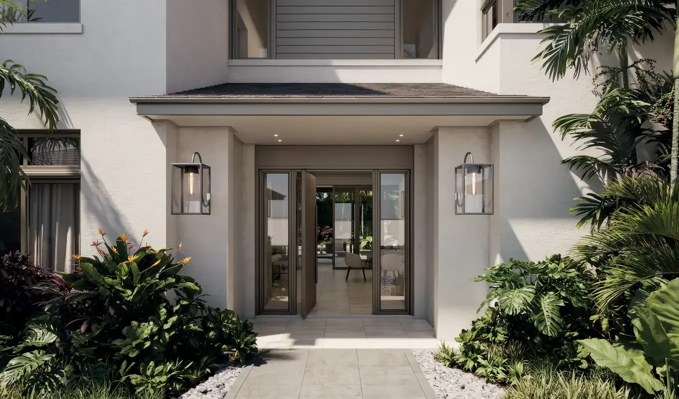 Entrada principal de una casa en Paseo del Este, Costa del Este, con puerta de madera y vidrio